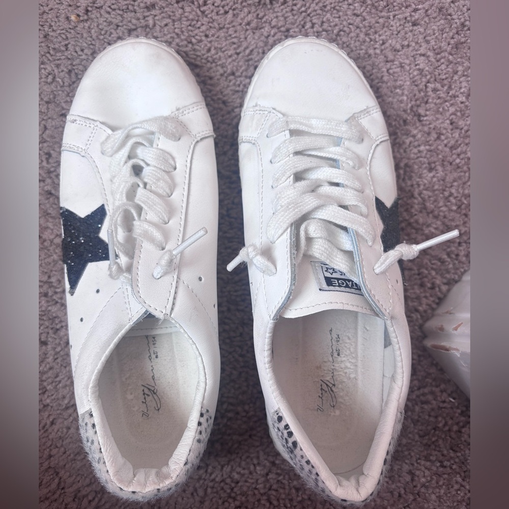 White Sneakers with Black Star Accent